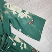 Velmira Maxikleid mit Blumenmuster und V-Ausschnitt – langärmeliges Kleid in A-Linien-Form