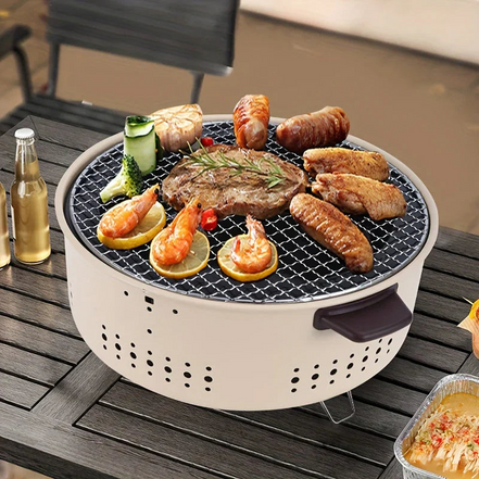 Tragbarer Holzkohlegrill mit kompakter Bauweise für den Außenbereich