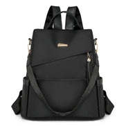 Tasselora Damen Anti-Diebstahl Rucksack aus Nylon mit Quasten-Detail