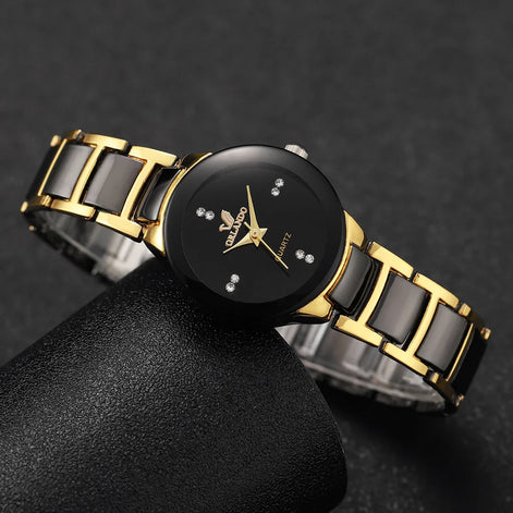 Damen Quarzuhr mit rundem Zifferblatt und Metallarmband